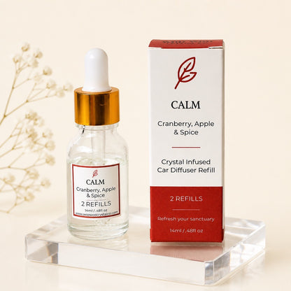 CALM refill dropper bottle beside its red box: Cranberry, Apple & Spice, 2 refills